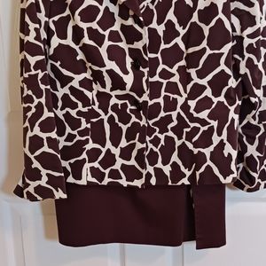 Le Suit, 2 piece animal print choc.Solid skirt with front side patterned slit.